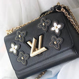 Front view of everyday-luxe refined women's handbag – women's designer-style accessory
