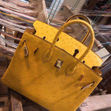 Side view of clean-lined structured handbag