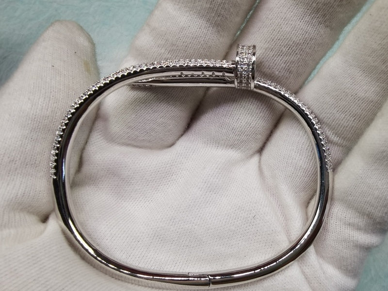 Side view of Cartier unisex jewelry piece