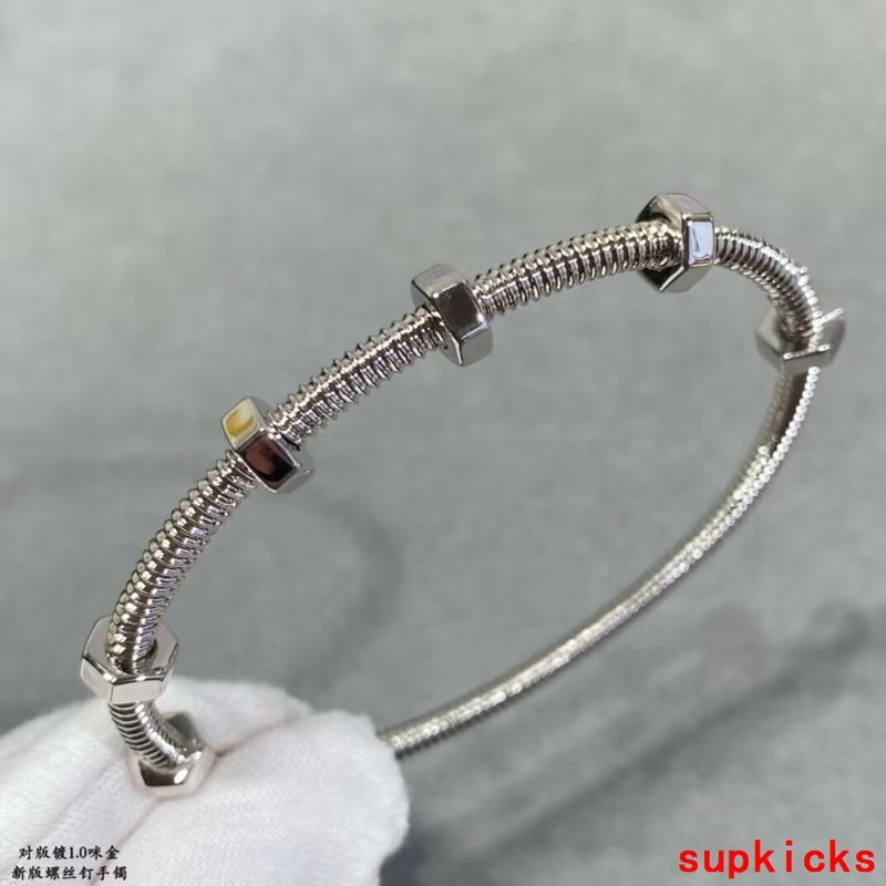 Side view of Cartier unisex jewelry piece