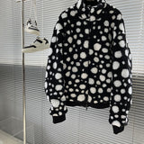Front view of Louis Vuitton luxury clothing with everyday silhouette