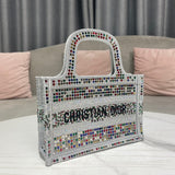 Side profile of polished structured women's handbag – women's luxury handbag