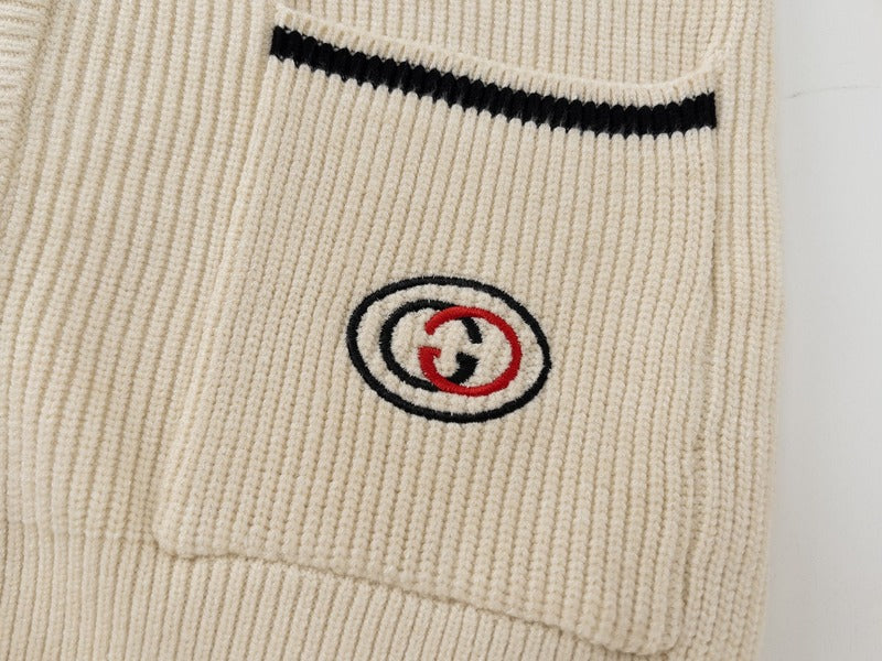 Flat lay presentation of Gucci luxury clothing with streetwear-inspired cut