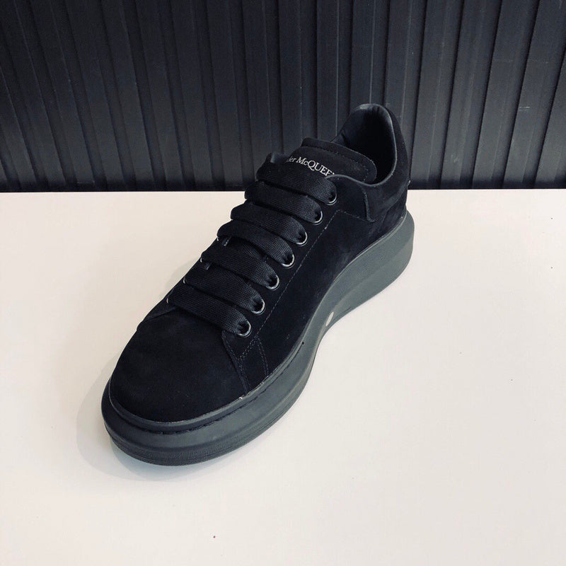Alexander McQueen tonal black luxury sneakers view 7 classic court silhouette