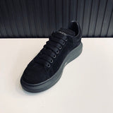 Alexander McQueen tonal black luxury sneakers view 7 classic court silhouette