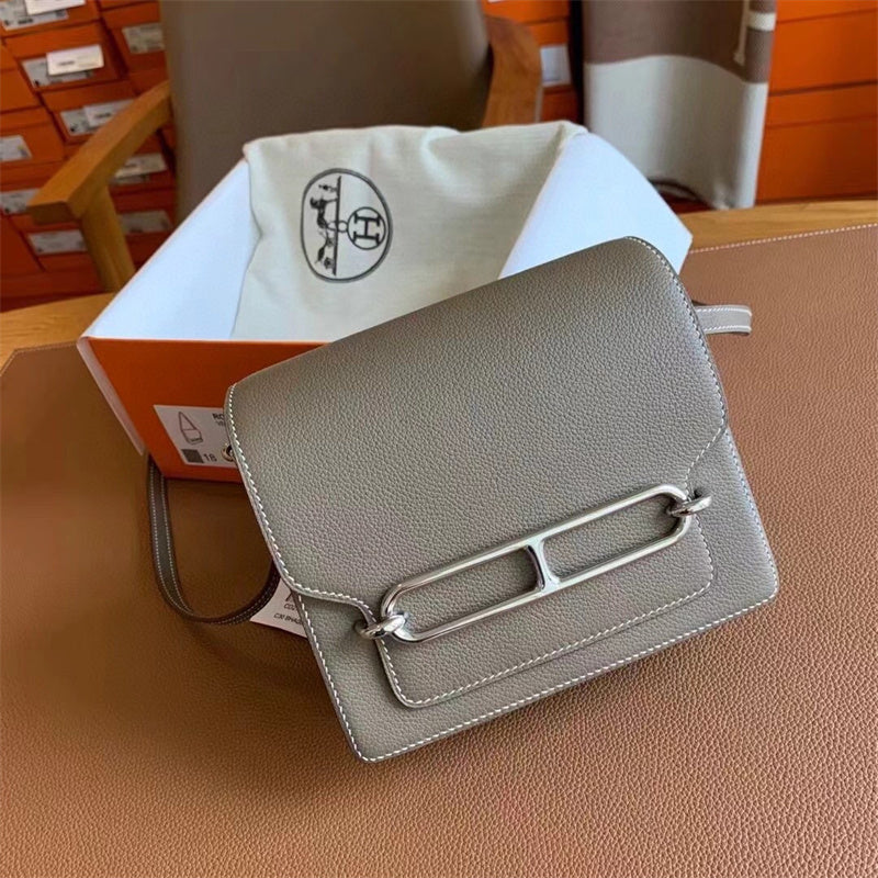 Side view of polished structured handbag