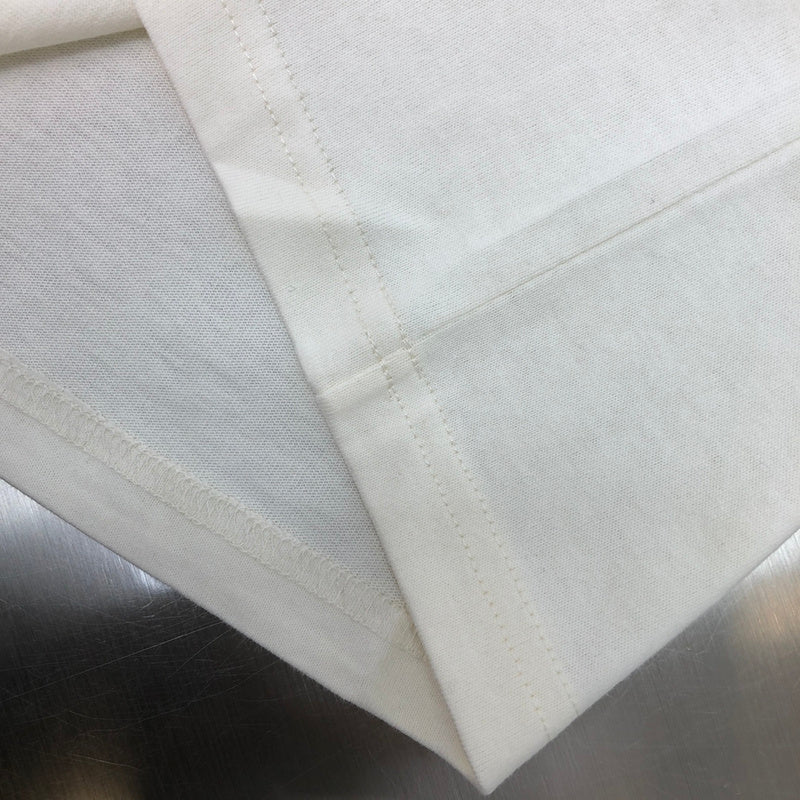 Full styled look of Louis Vuitton cotton t-shirt with label-forward styling