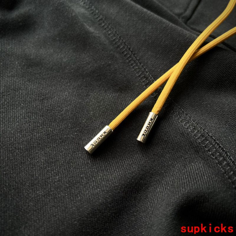 Side profile of Rhude luxury clothing with everyday silhouette