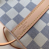 Front view of sleek classic women's handbag – women's statement bag