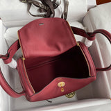 Side view of polished structured handbag
