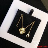 Lifestyle view of Van Cleef & Arpels unisex jewelry piece