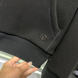 Back view of Louis Vuitton luxury clothing with contemporary cut