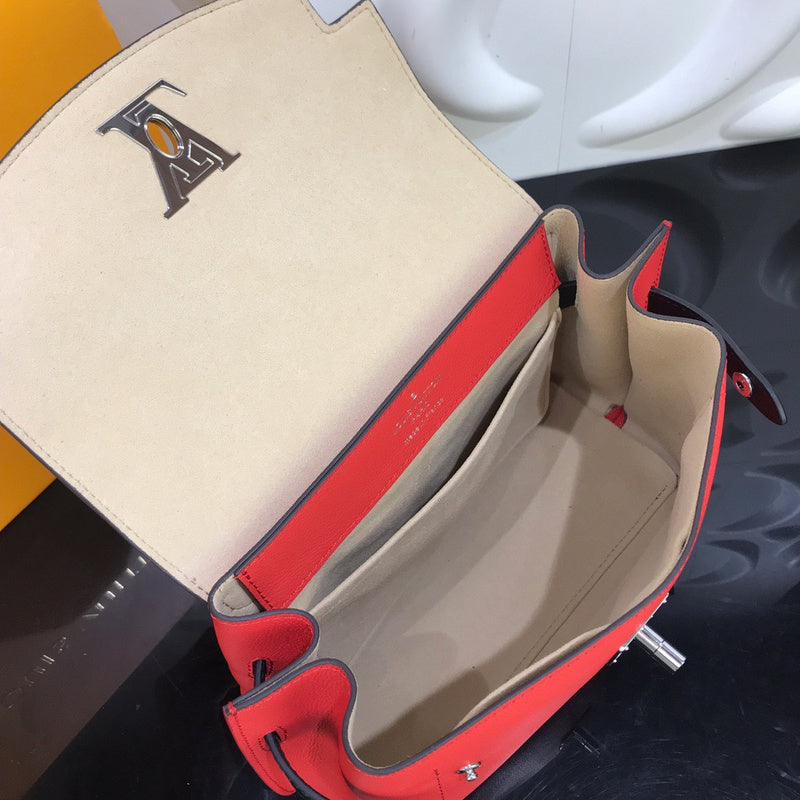 Front view of polished refined women's handbag – women's statement bag