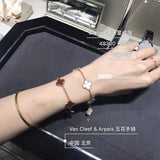Front view of Van Cleef & Arpels unisex jewelry piece