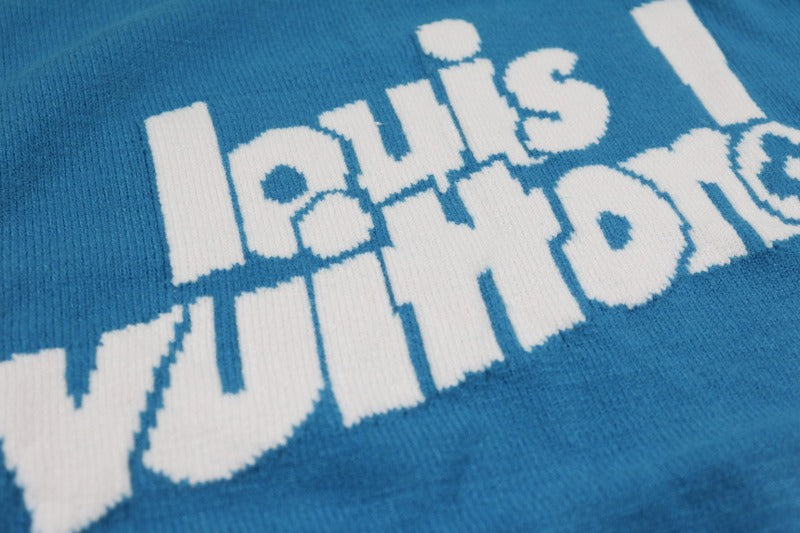 Full styled look of Louis Vuitton luxury clothing with logo-detail design