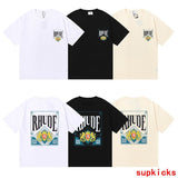 Front view of Rhude luxury clothing with monogram-inspired silhouette
