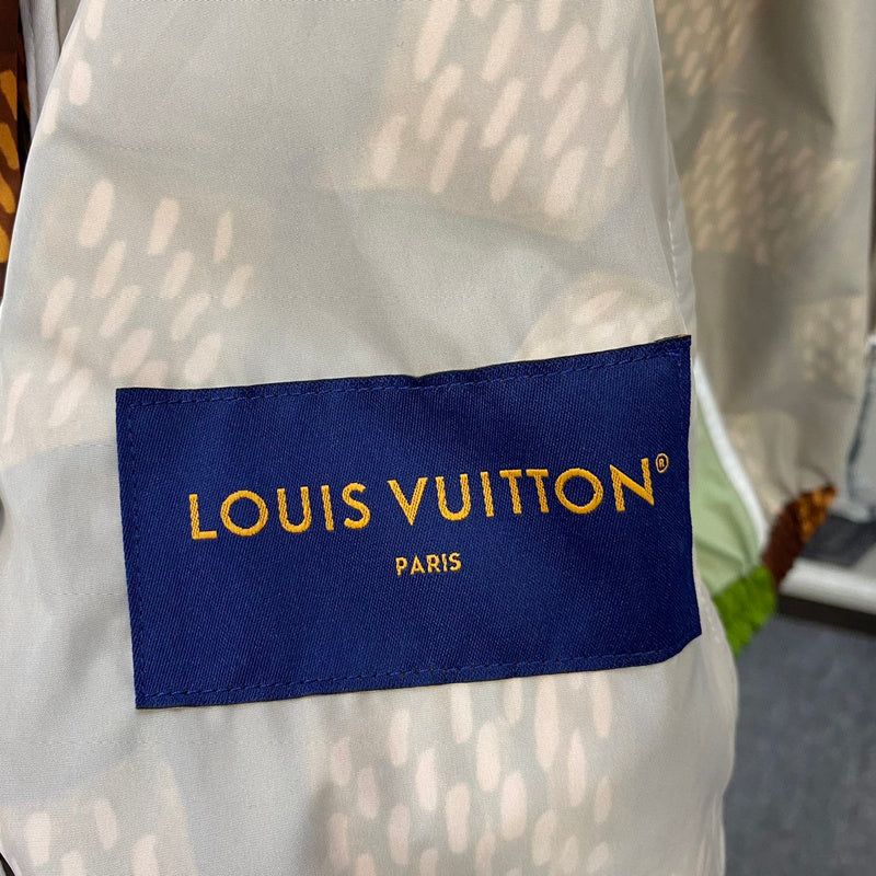 Back view of Louis Vuitton luxury clothing with everyday silhouette