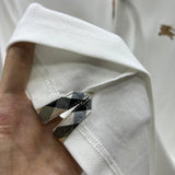 Close-up of Burberry designer clothing craftsmanship