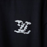 Flat lay presentation of Louis Vuitton cotton t-shirt with monogram-inspired silhouette