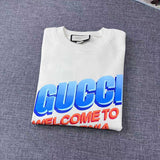 Back view of Gucci luxury clothing with signature branding
