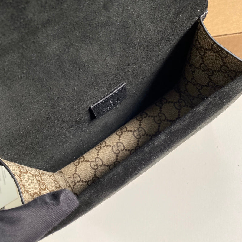 Side profile of premium chic women's handbag – women's statement bag
