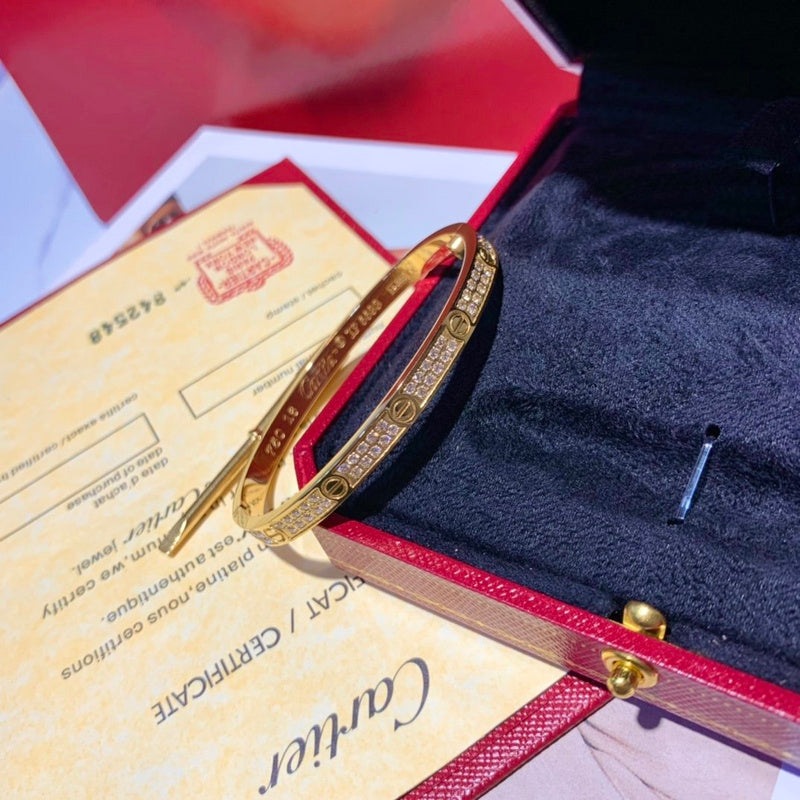 Side view of Cartier unisex jewelry piece