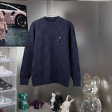 Full styled look of Louis Vuitton luxury clothing with tailored silhouette