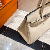 Side view of refined structured handbag