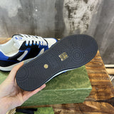 Side profile of Gucci muted earth tones sneakers low-top design
