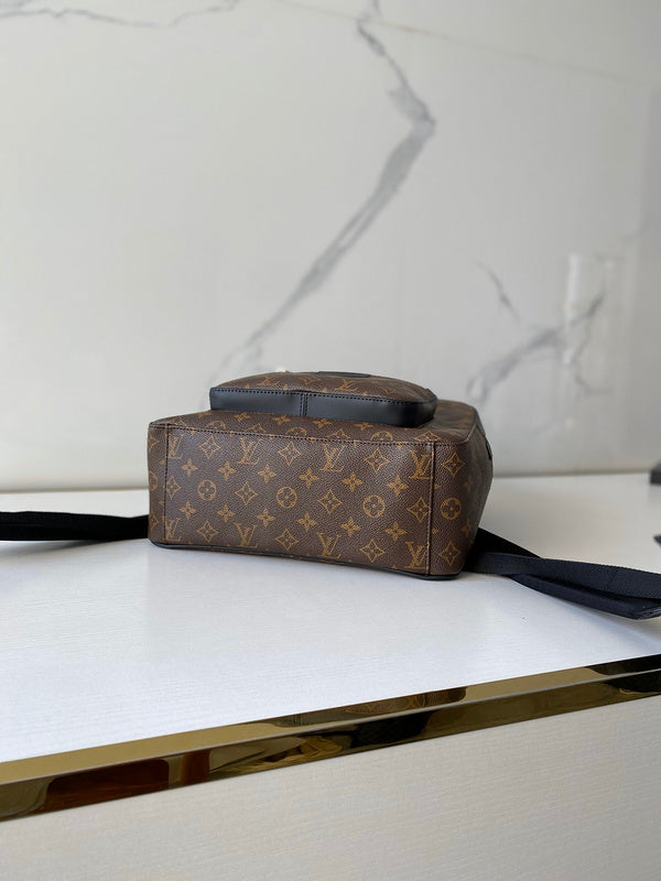 Side profile of modern signature women's handbag – women's statement bag