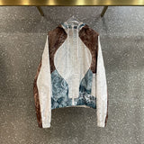 Close-up detail shot of Louis Vuitton luxury clothing with monogram-inspired silhouette