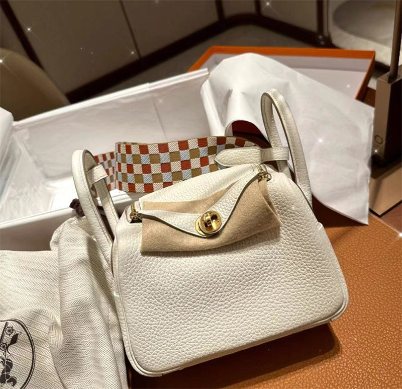 Side view of streamlined structured handbag