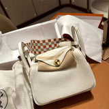 Side view of streamlined structured handbag