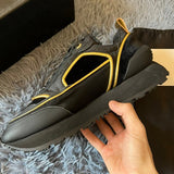 Gucci classic monochrome luxury sneakers view 4 retro runner design