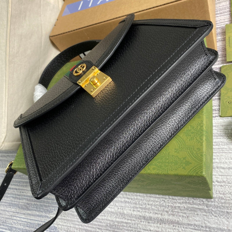 Handle and strap detail of structured everyday-luxe women's handbag – women's designer-style accessory