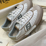Fendi Sneakers flat lay on neutral background