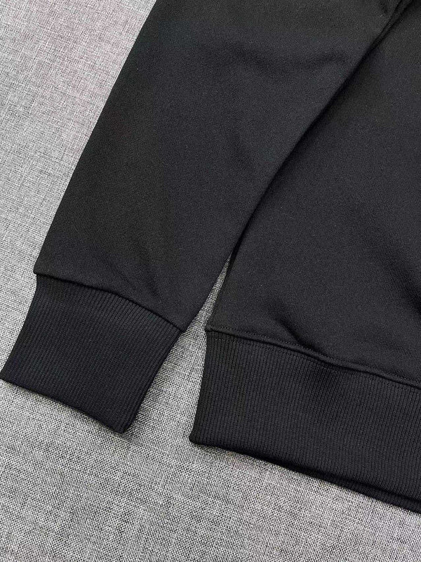 Side profile of Gucci luxury clothing with signature branding