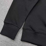 Side profile of Gucci luxury clothing with signature branding