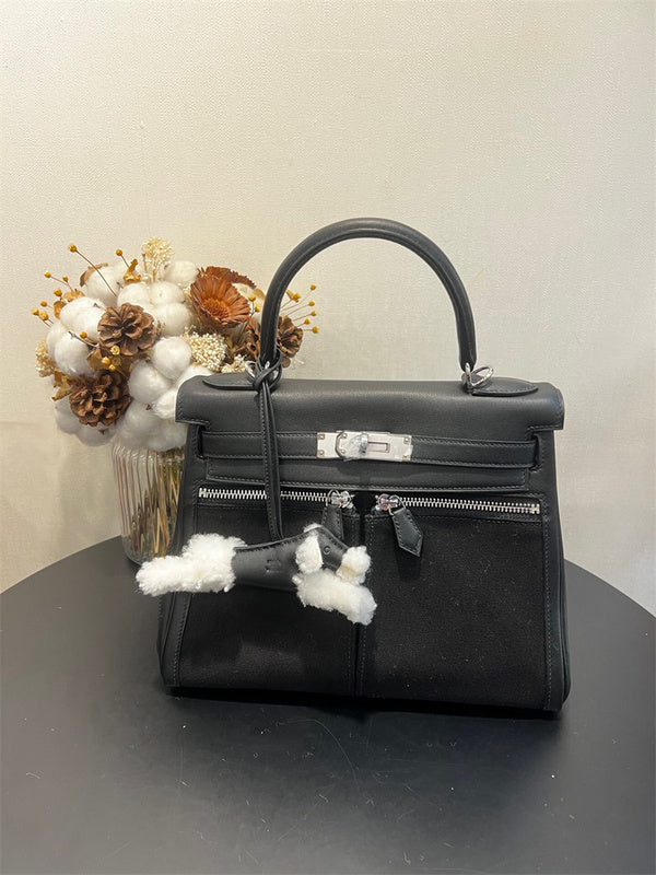 Side view of sculpted structured handbag