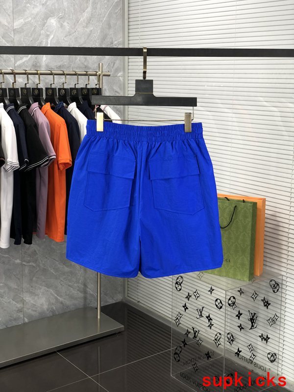 Side profile of Rhude luxury clothing with logo-detail design