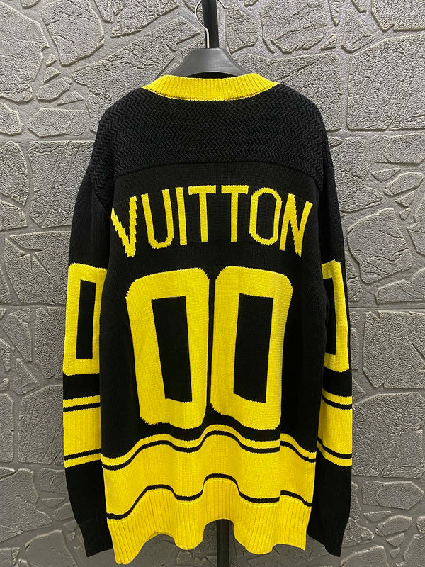 Close-up detail shot of Louis Vuitton luxury clothing with runway-inspired design