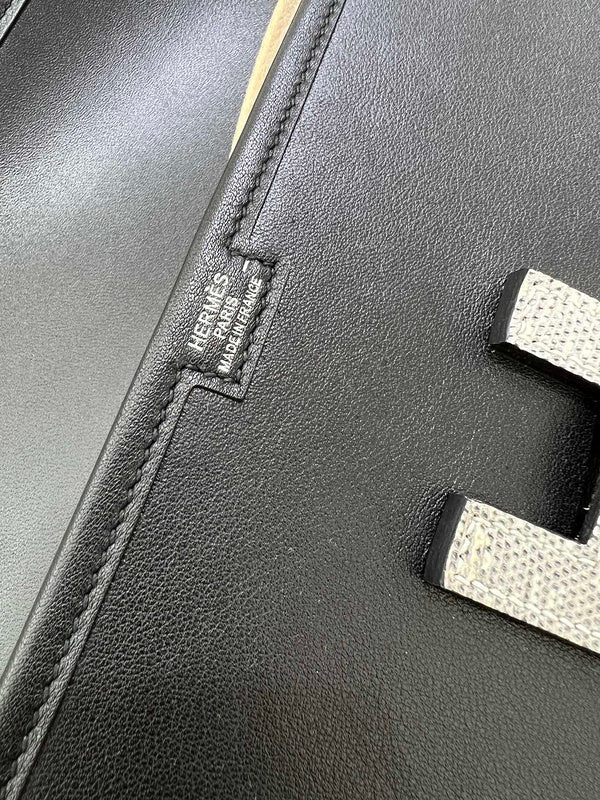 Side view of timeless structured handbag
