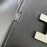 Side view of timeless structured handbag