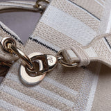 Handle and strap detail of polished classic women's handbag – women's luxury accessory