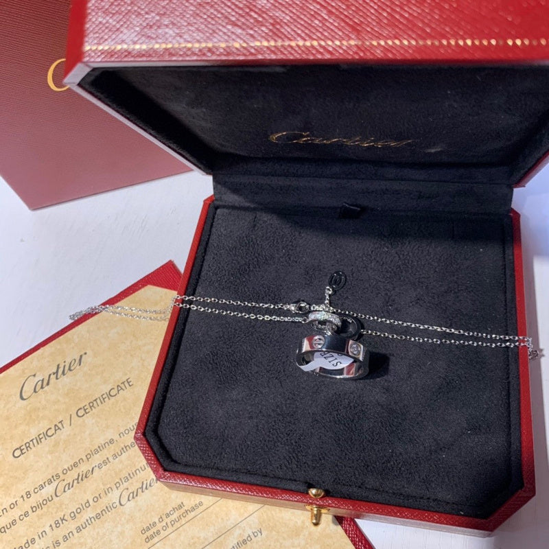 Side view of Cartier unisex jewelry piece