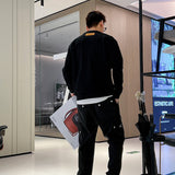 Back view of Louis Vuitton luxury clothing with contemporary cut
