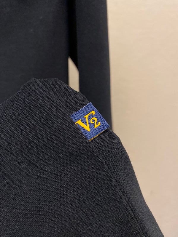 Front view of Louis Vuitton luxury clothing with runway-inspired design