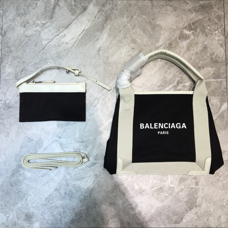 Understated Faux Leather Handbag - Modern Structured Build | Women's Fashion Handbag #754 - side angle view (image 2) of designer-inspired handbag