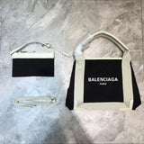 Understated Faux Leather Handbag - Modern Structured Build | Women's Fashion Handbag #754 - side angle view (image 2) of designer-inspired handbag