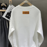 Side profile of Louis Vuitton luxury clothing with contemporary cut